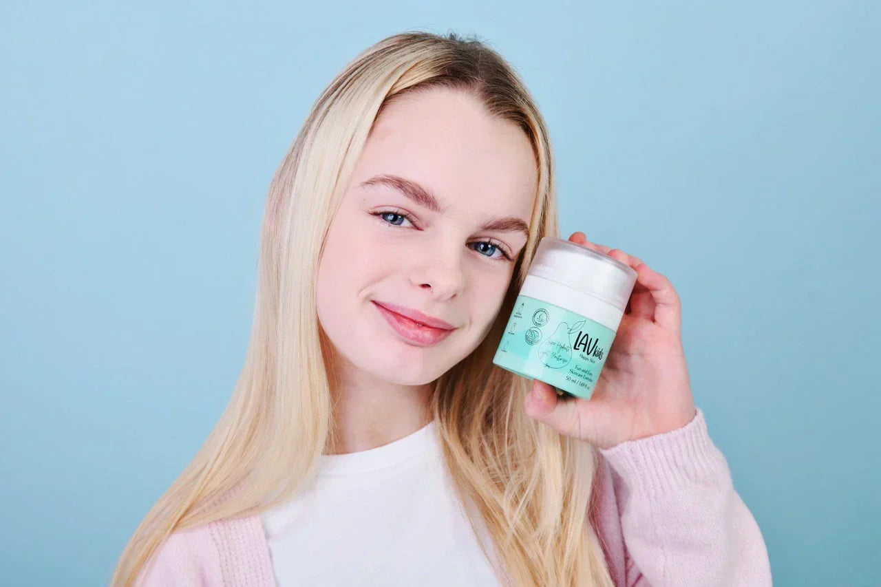 Child enjoying a simple daily skincare routine with Lav Kids products