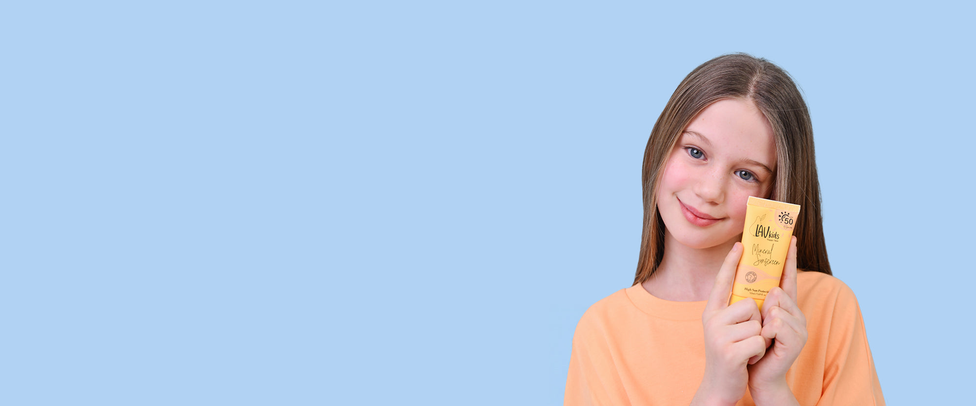 kid showing sunscreen by Lav kids
