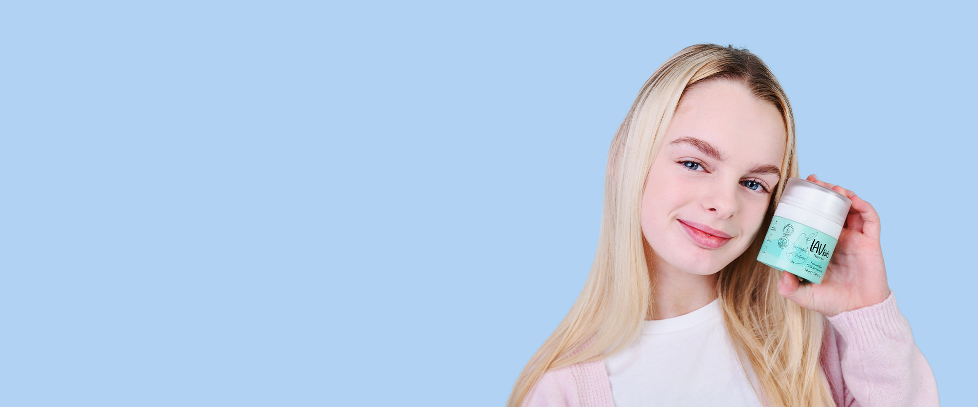 small girl showing a product by Lav Kids